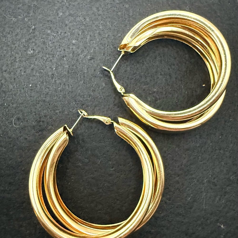 Gold pierced hoop earrings